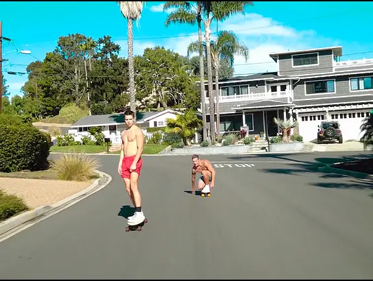 Longboard boys railing rigid on the street and in couch!