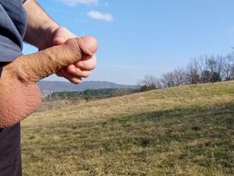 IamHornyBobo jerks off with a thick lollipop and spunk twice in a meadow of enormous dicks