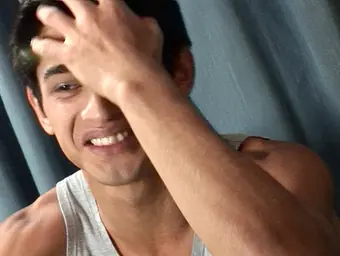 Supreme-looking twunk posing at the studio